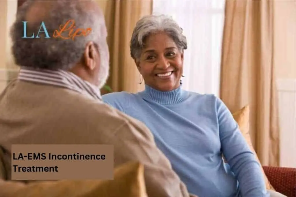 Couple sat smiling at each other - LA-EMS treatment Willesden